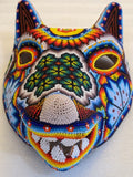 Cabeza de coyote con cuentas huichol